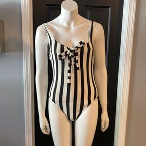 Black and cream striped one piece swim suit